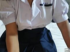 Thai student sucks cock, rides it, and gets creampie on her shiny skirt