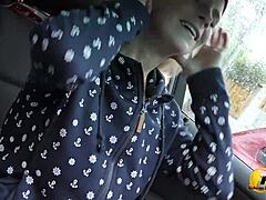 This busty blonde Czech milf masturbates with big tits exposed in her car on public parking.