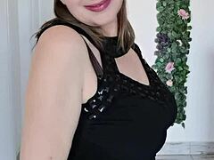 Stepmother gently teases her stepson with her huge breasts and draws him into a close moment.