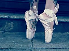 Ballerina In Ballet Shoes Walking Down Street