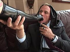 I watch this blonde ride a monster cock in leather boots on the sofa