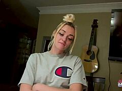 Petite blonde rubbing her juicy tits?