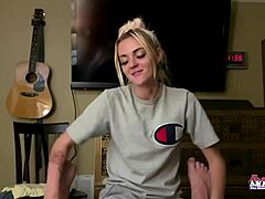 Petite blonde rubbing her juicy tits?