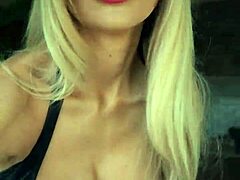 Woman shows off in wetlook suit and patent leather boots