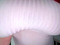 Mature milfs dress shines through, showing big ass in thong