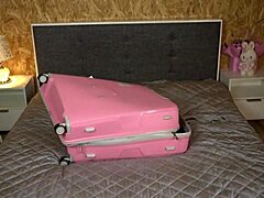 She climbed suitcase