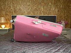 She climbed suitcase